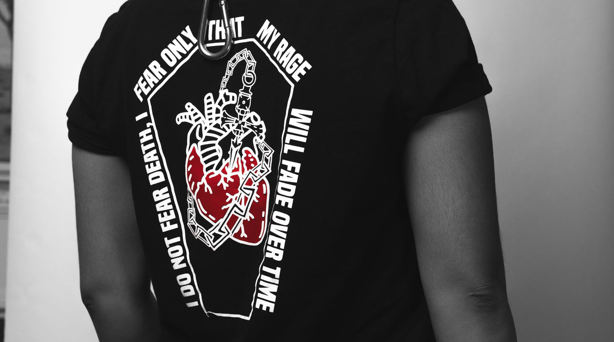 Black Friends with the Devil graphic tee worn with a chain necklace